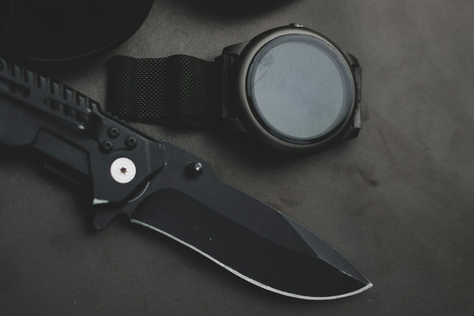 Photo by Saif71.com black and silver scissors on brown wooden table