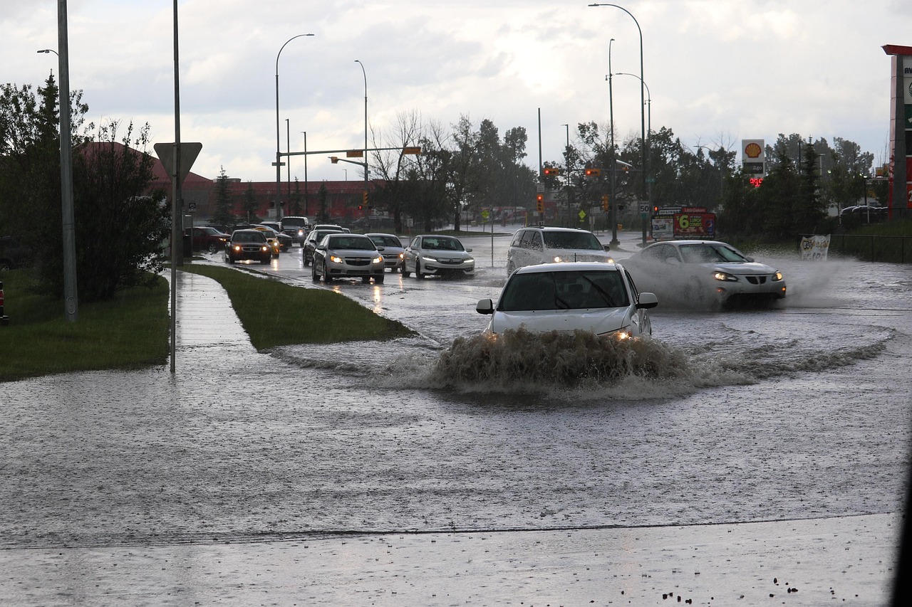 Photo by AllThingsCoastal flooded, road, flood, flooding, storm, rain, nature, water, wet, thunderstorm, city